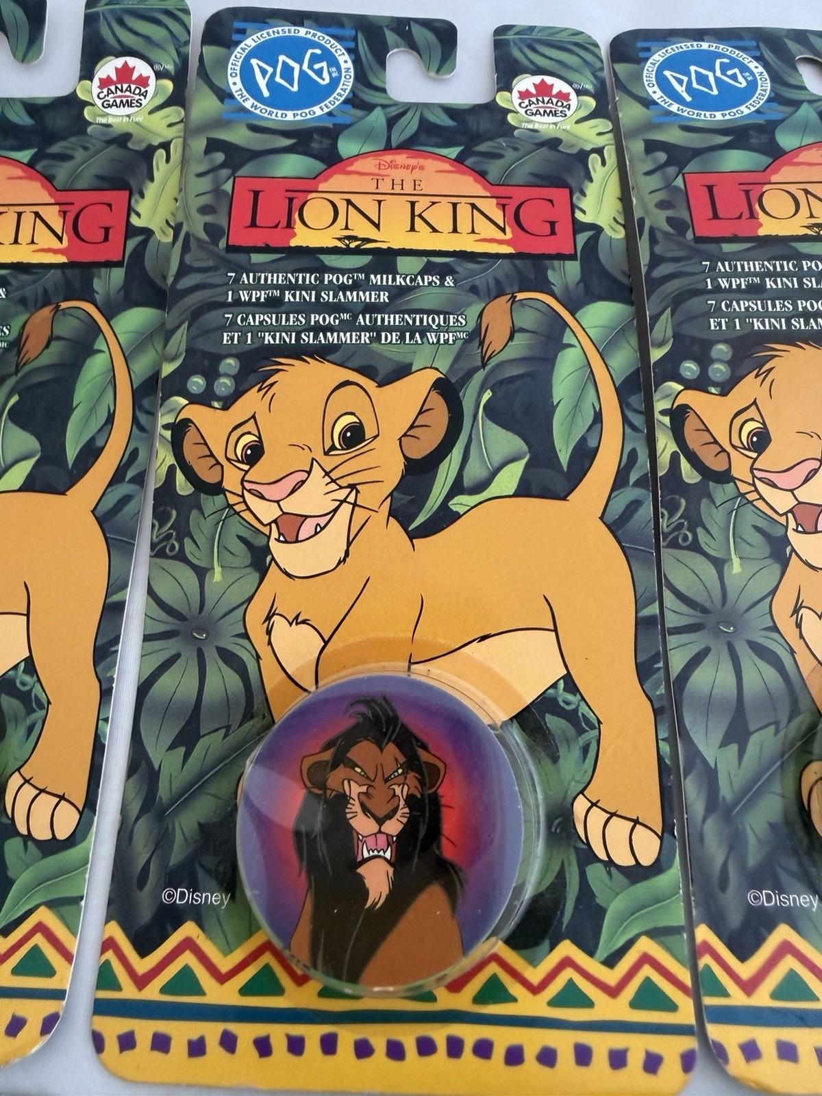 The World Pog Federation Lot of 7 The Lion King Carded Pogs with Slammer New