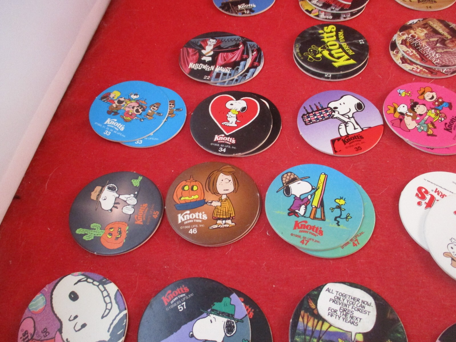 Set of 75 Knott’s Berry Farm Pog Rides & Peanuts Charlie Brown Snoopy w/Slammers