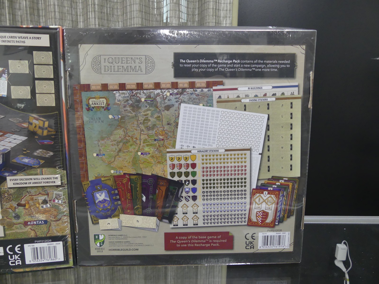 Queen’s Dilemma Boardgame and Recharge Pack Horrible Guild Game Studio