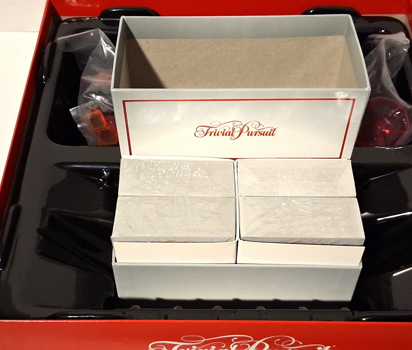 Trivial Pursuit 40th Anniversary Ruby Edition. Open Box. Never Played.