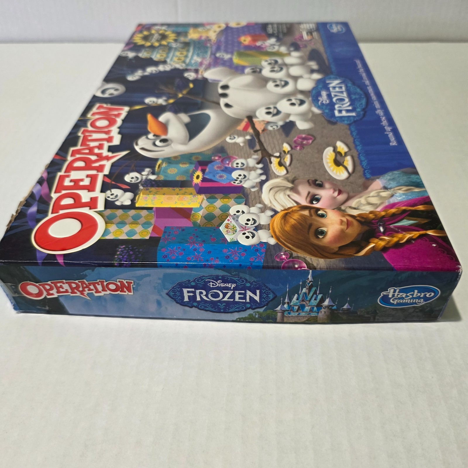 Hasbro Gaming Disney Frozen Operations with 11 Snowman
