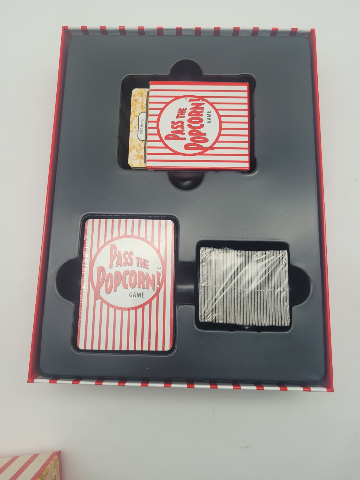 Pass the Popcorn Game with Bonus Booster Star Connection Actor Card Game
