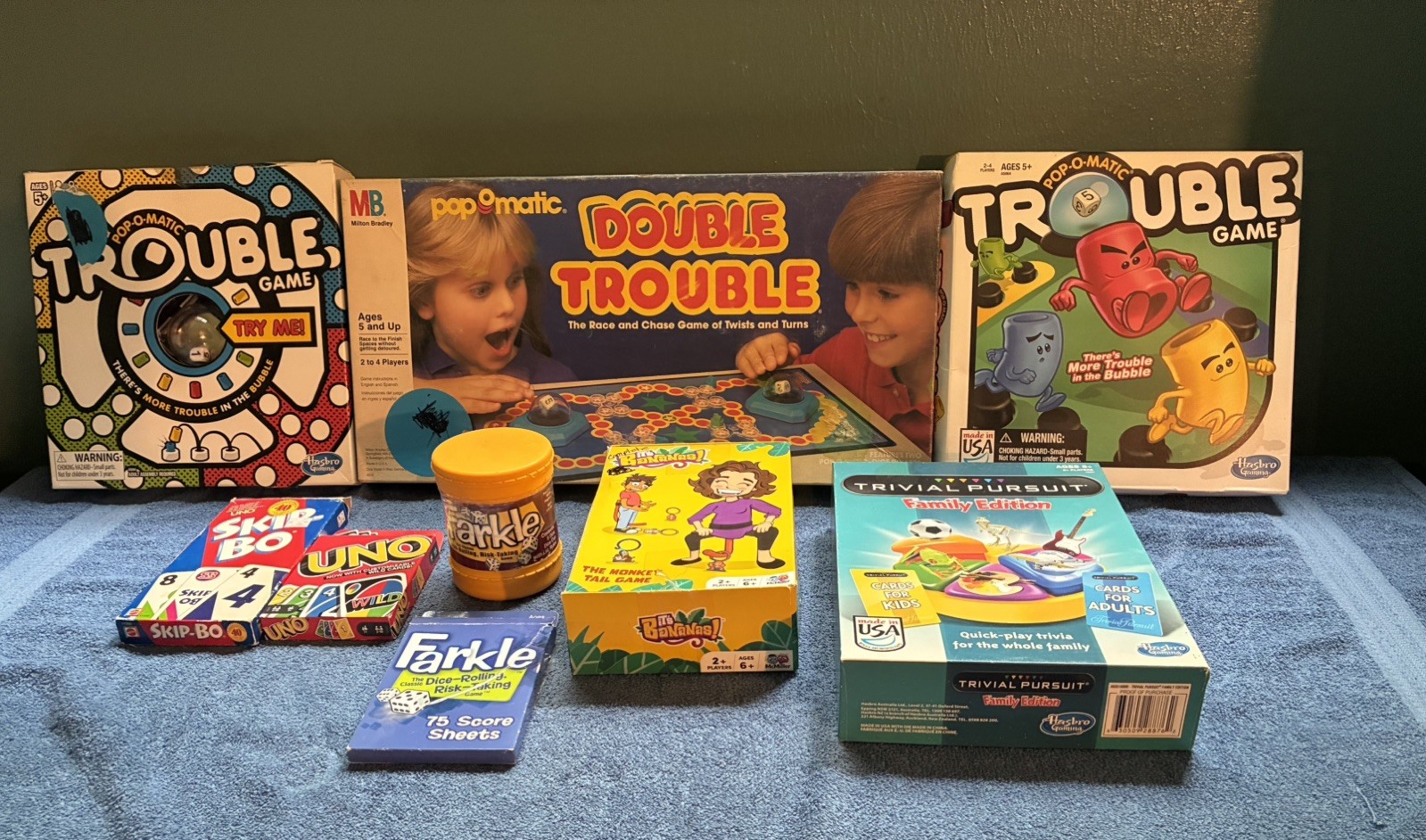 Mixed lot of pre owned games Trouble, vintage Double Trouble,Farkle, Uno, Skipbo
