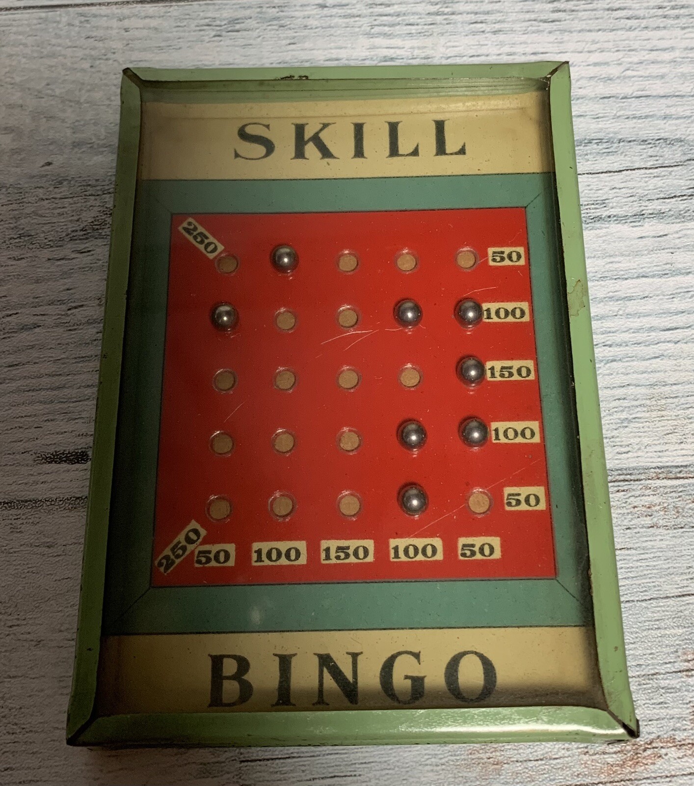 Early 1900’s Dexterity Tin Skill Bingo Game