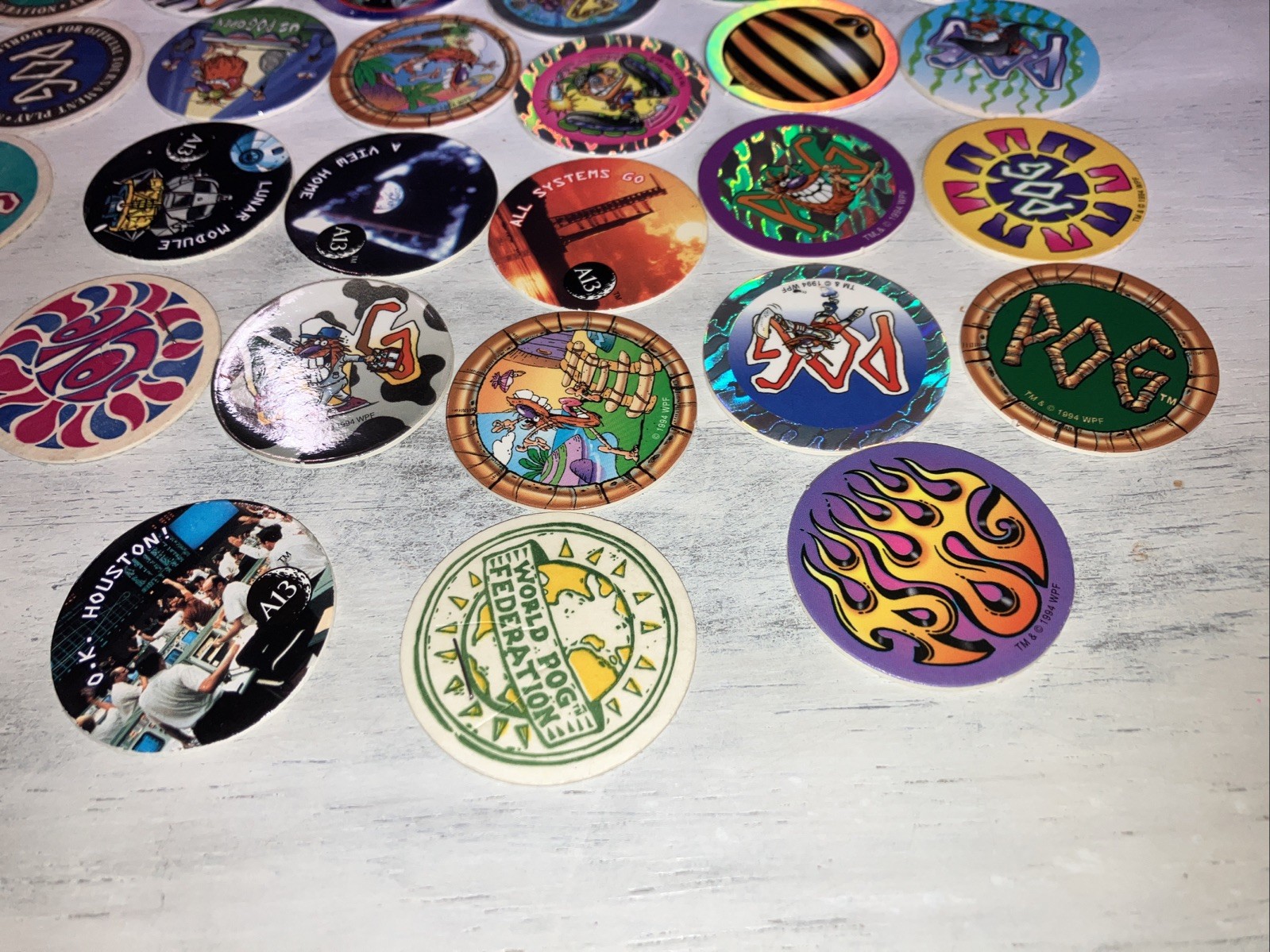 Lot of 34 Pogs from 1994/95 The World Pog Federation Authentic POG Brand WPF