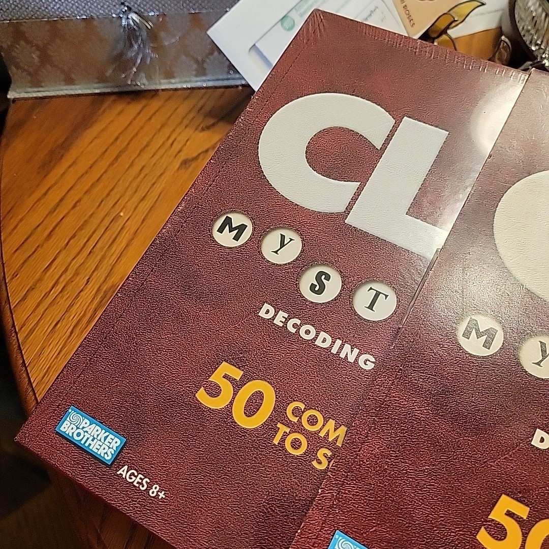 2005 CLUE Mysteries Decoding Detective Board Game New Sealed Box w/Outer Sleeve