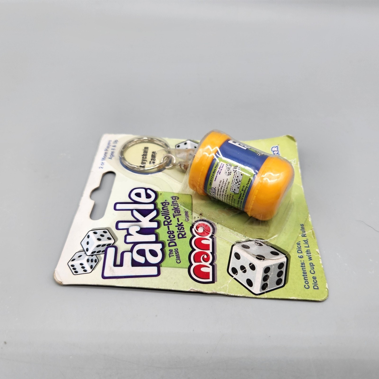 Farkle Nano Keychain Mini Dice Game 2016 Yellow Sealed *Package Wear See Photos