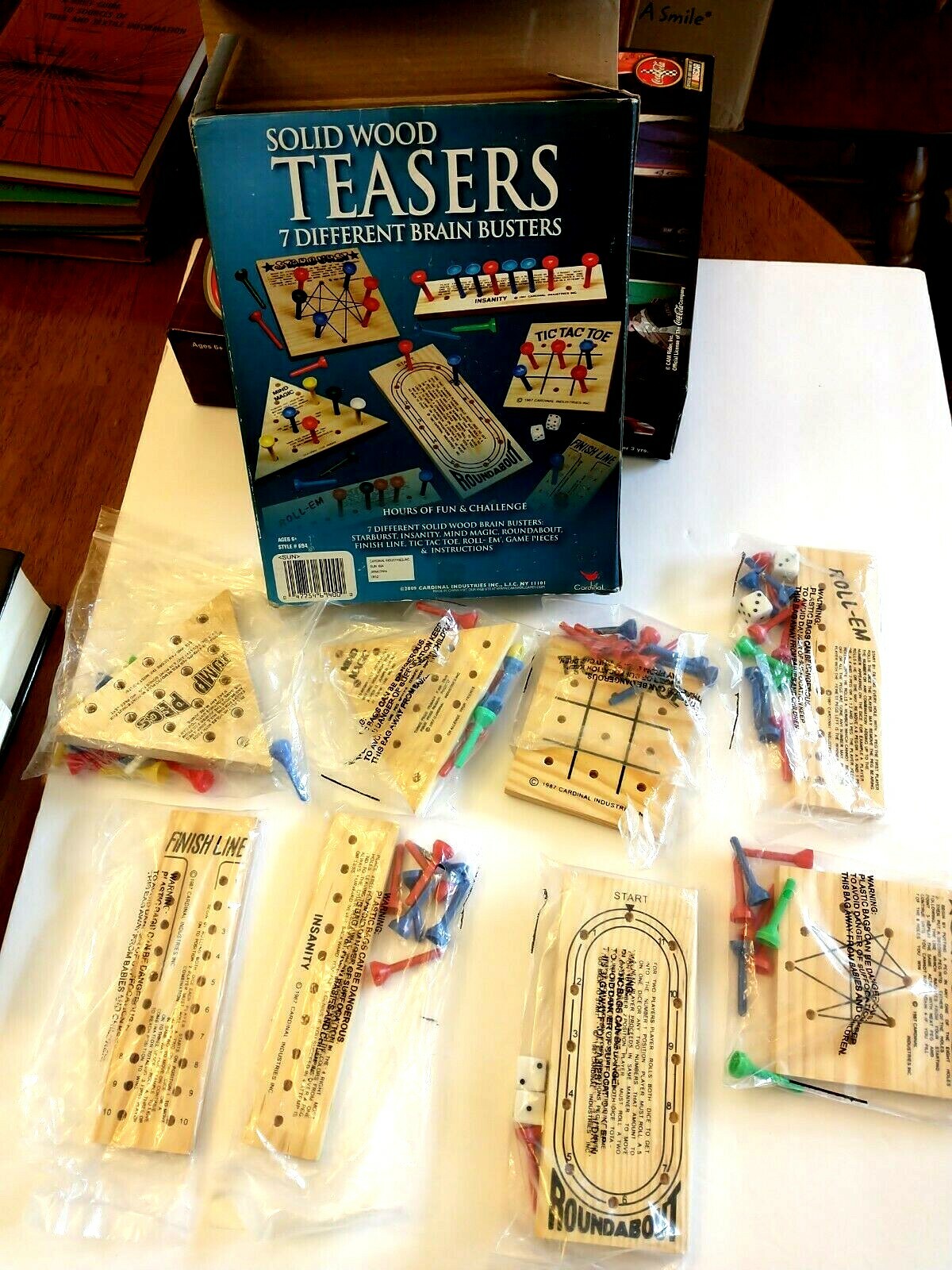 Cardinal Solid Wood Teasers Game 7 Different Brain Busters Games in Box