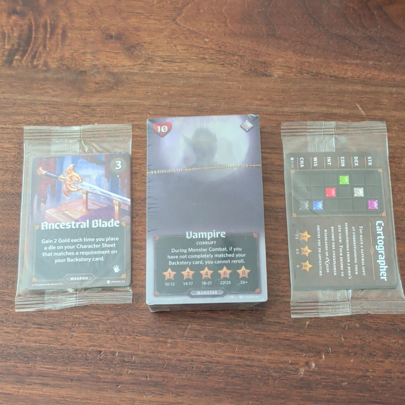 Roll Player promos inclding 3 card promo pack w/cartographer! Lenticular, Lockup