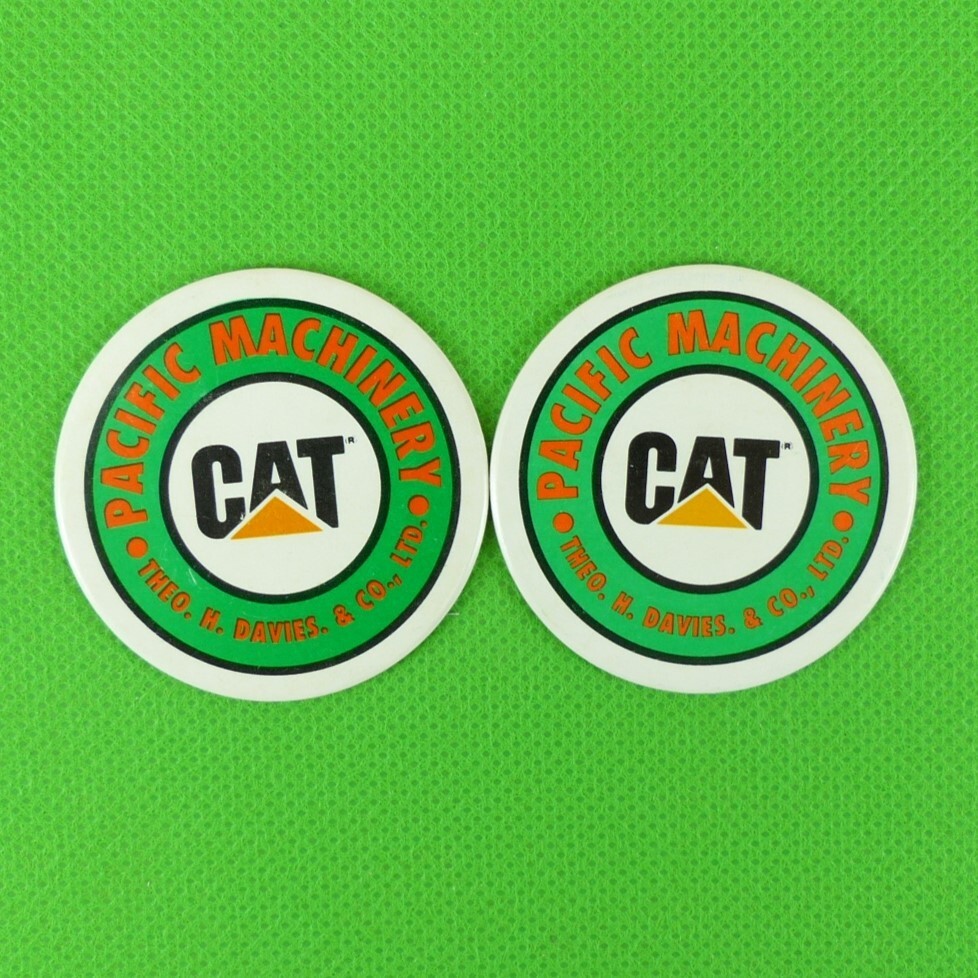 2 Pogs of CAT Pacific Machinery Theo. H. Davies. & CO., LTD. from early 1990s