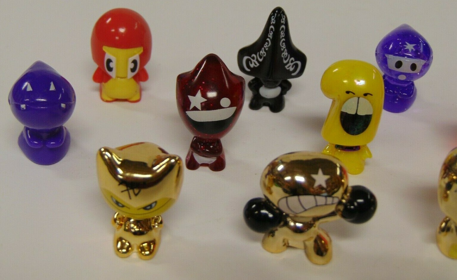 Gogo’s Crazy Bones Lot of 12 with gold bone and Green Cloth Bag pouch