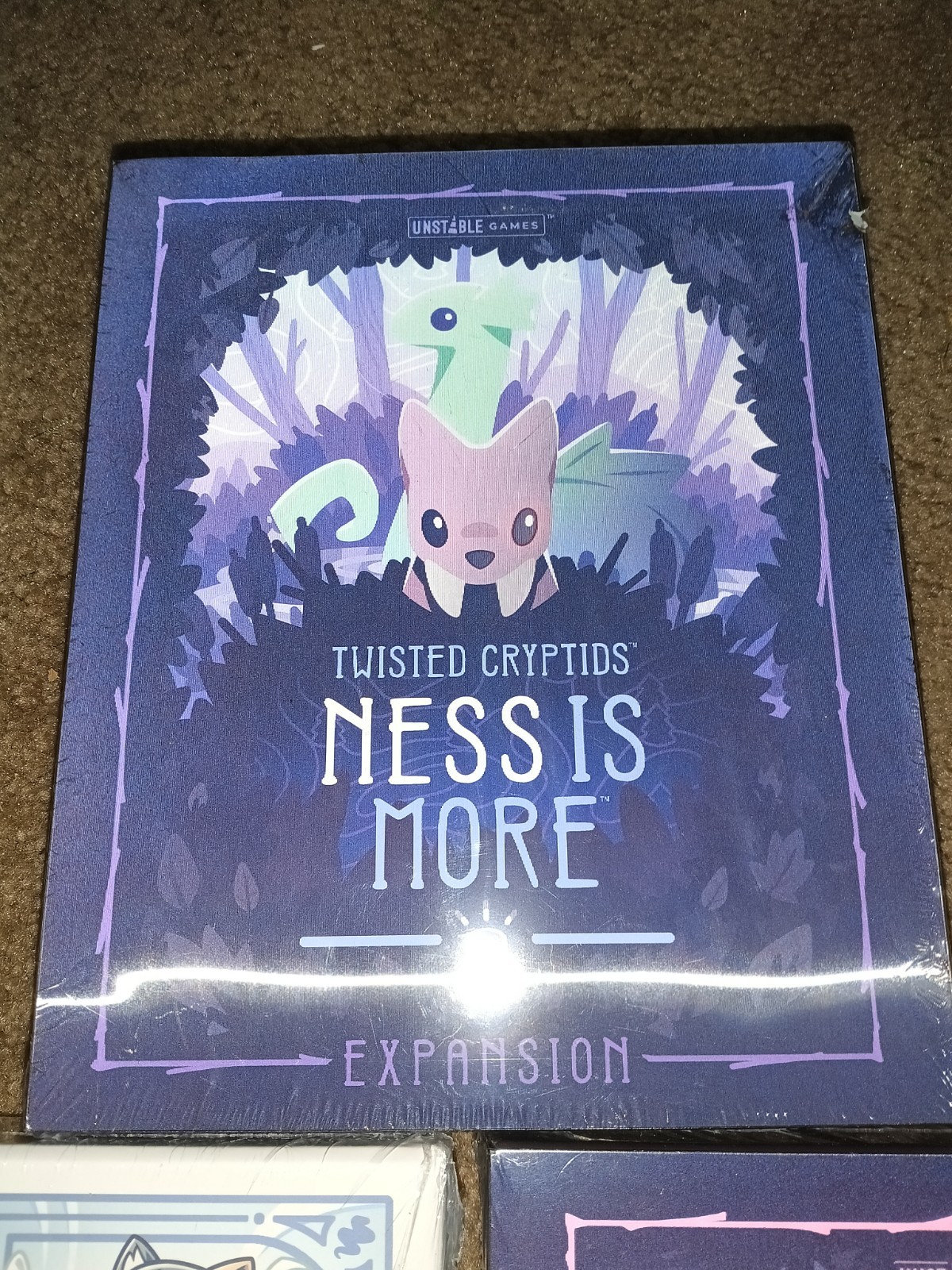 3x Unstable Games Twisted Cryptids Ness is More,And 2 More Packs Strategy Games