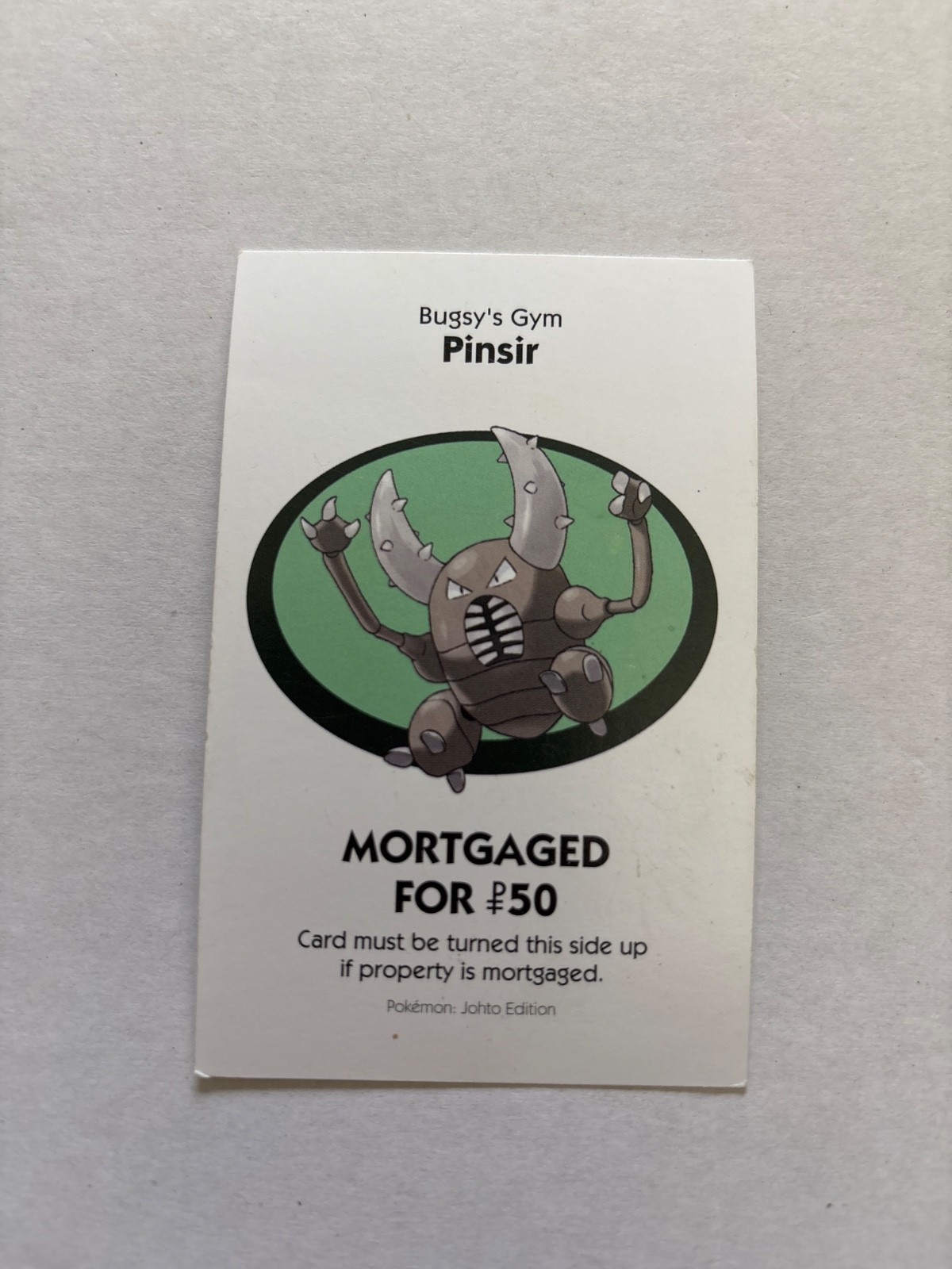 2016 Monopoly Pokémon Title Deed Card Game Piece Light Blue Bugsy Gym Pinsir