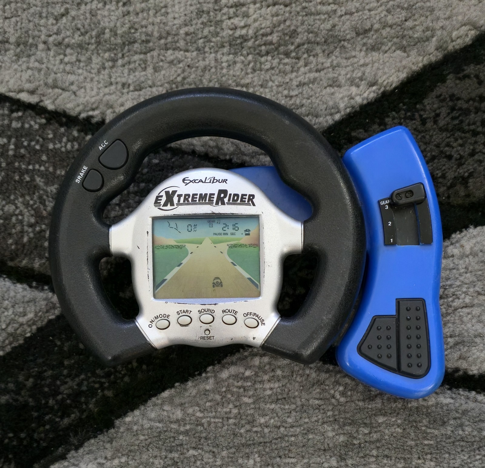 EXCALIBUR Extreme Rider Electronic Handheld Travel Game