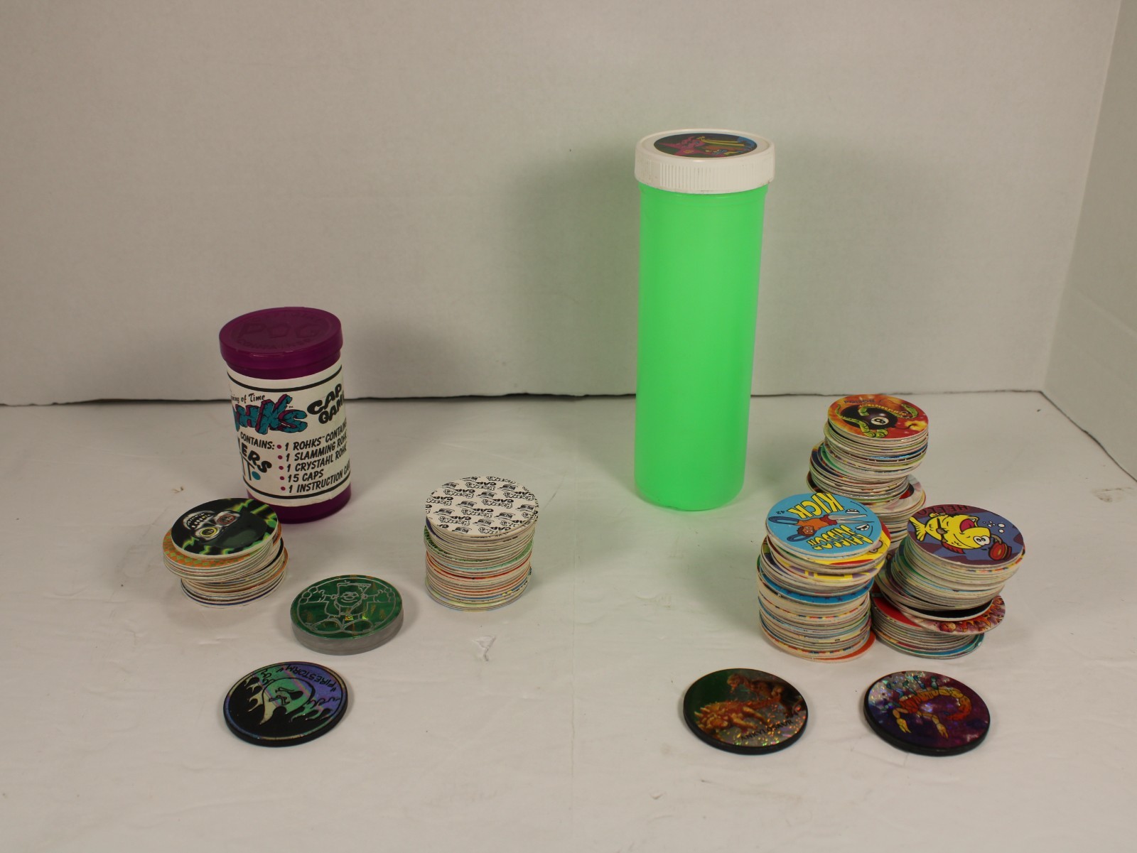 90s Nostalgia Lot: Vintage Pogs & Rohks Slammers with Storage Tubes – Huge Colle