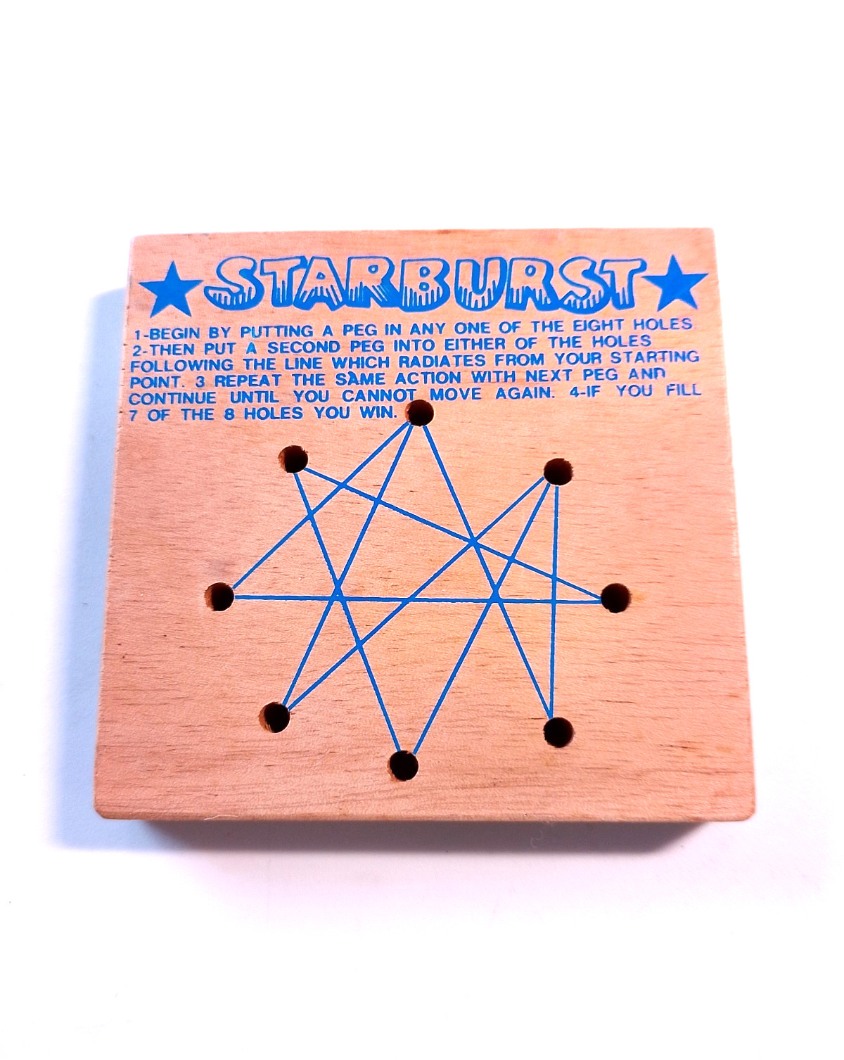 Vintage Starburst wooden peg board game brain teaser