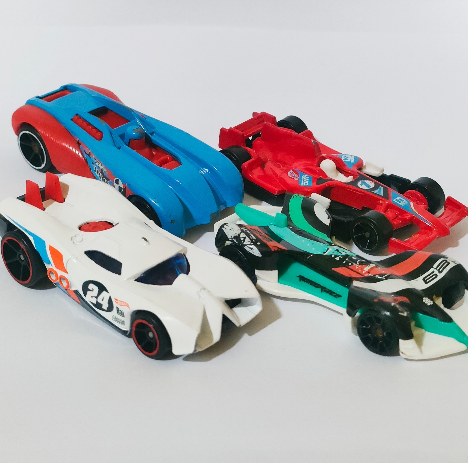 Lot of 4 Hot Wheels Racing Cars – Diecast Collectible Toy Vehicles Set