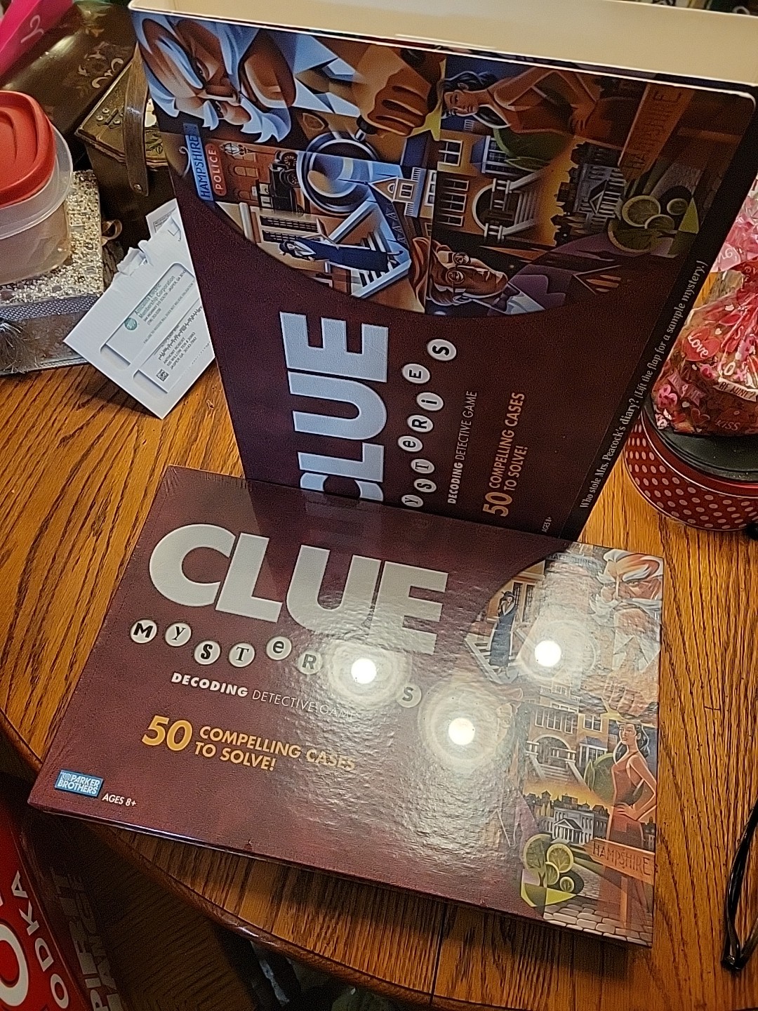 2005 CLUE Mysteries Decoding Detective Board Game New Sealed Box w/Outer Sleeve